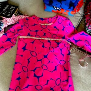 Mahi Gold BIMINI (?) dress. Curved hem